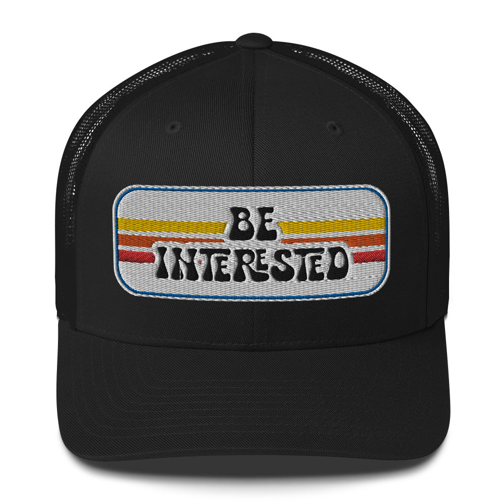 Be Interested Trucker Hat