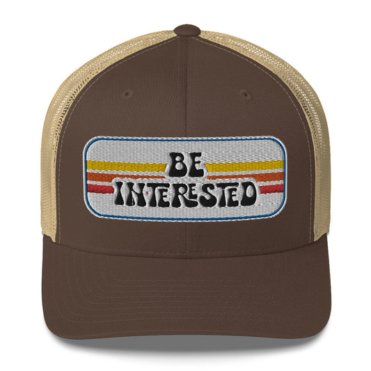 Be Interested Trucker Hat