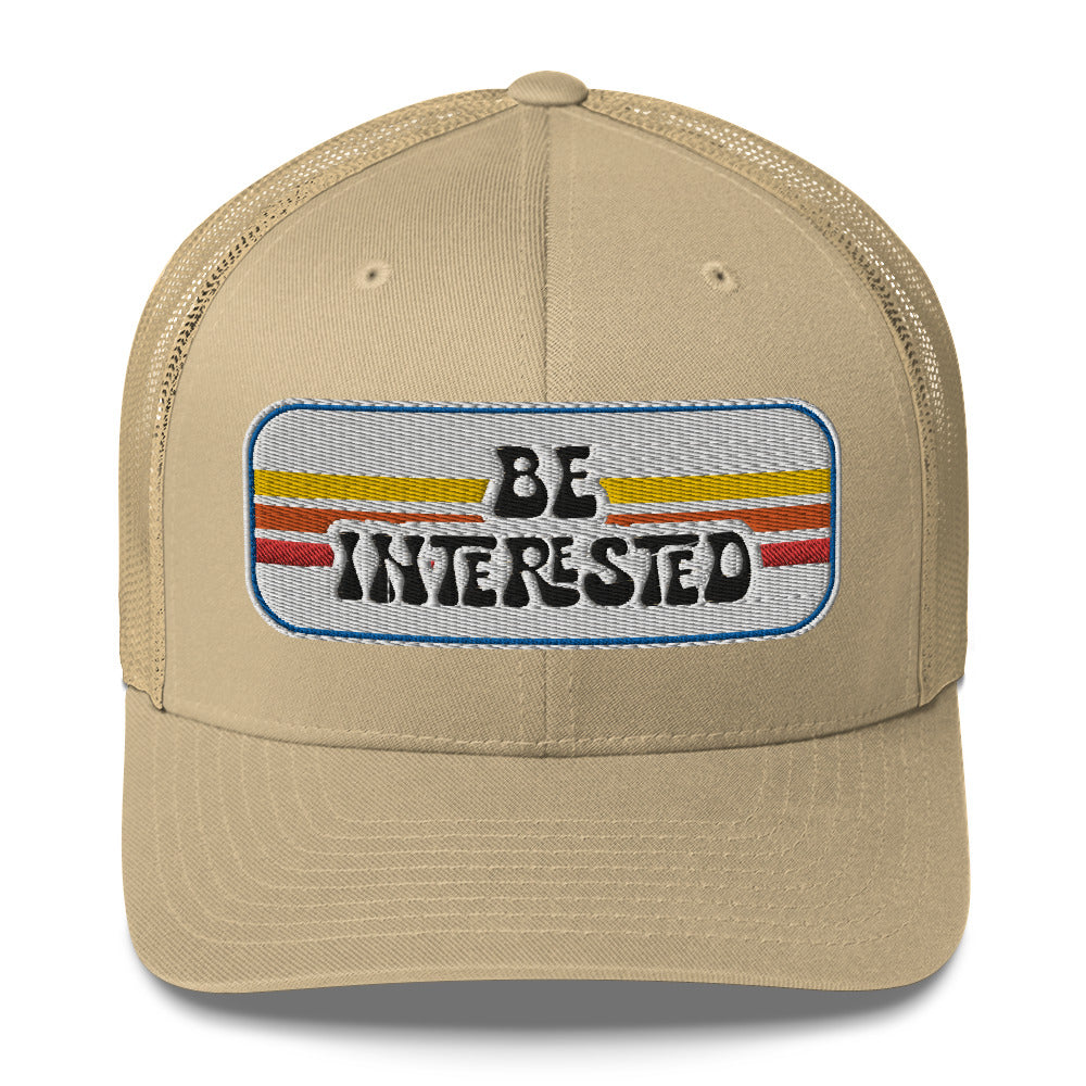 Be Interested Trucker Hat